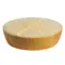 Half-cut Parmesan cheese wheel with crystalline texture for pasta and fondues.